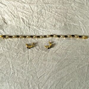Matching bracelet and earrings in gold overlay and sapphire’s.